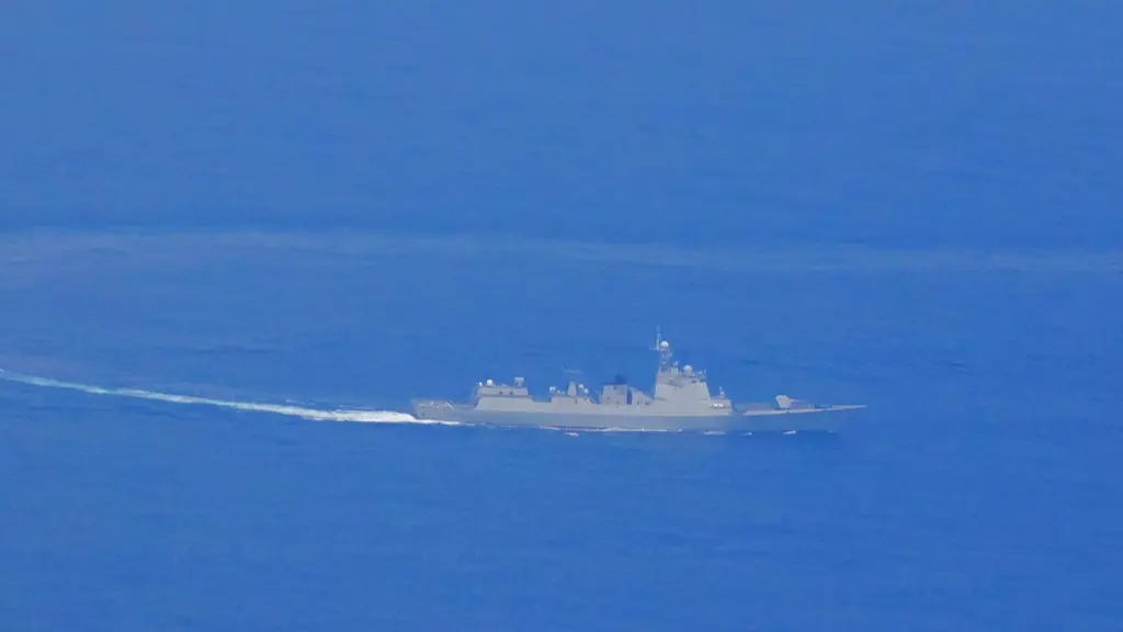 A photo released by the Taiwanese Defence Ministry shows a Chinese guided missile destroyer near the coast of the island nation.
