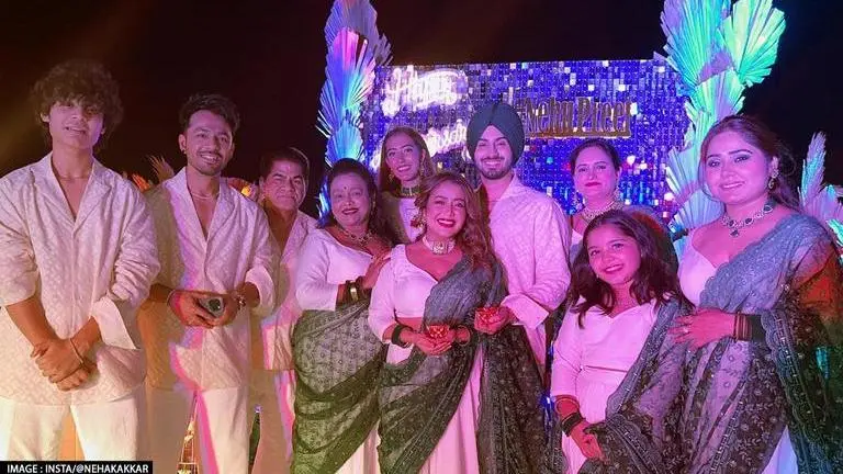 Neha Kakkar turns fashion designer for hubby Rohanpreet, family on 2nd wedding anniversary Neha Kakkar