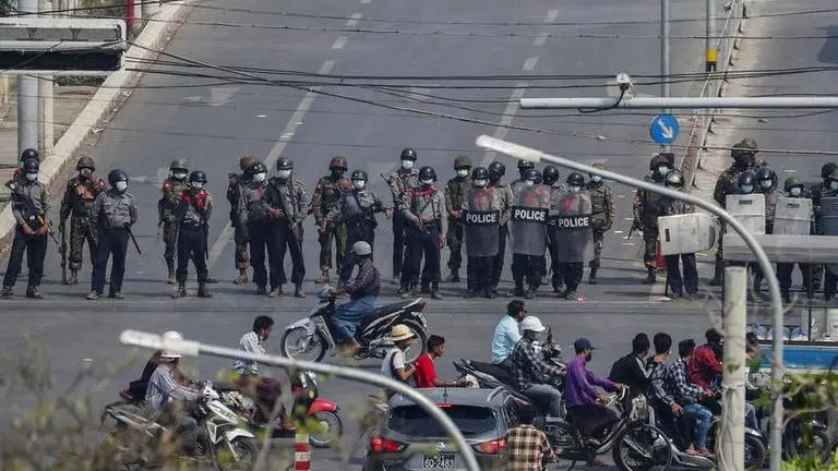 Myanmar police deploy early to crank up pressure on protests