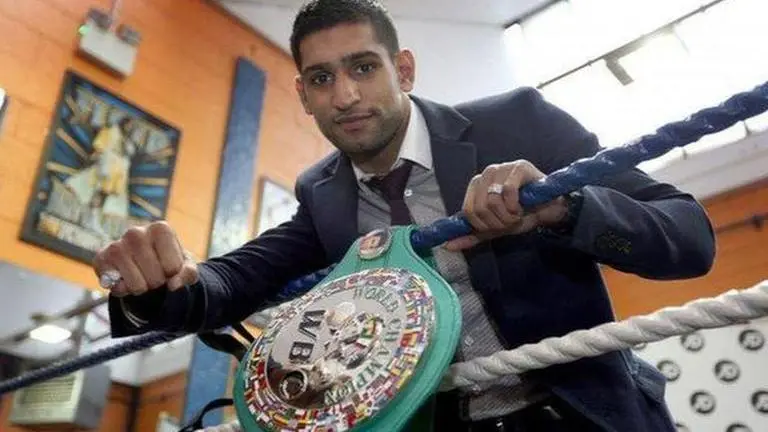 Former world boxing champion Amir Khan announces retirement; 'Time to hang up my gloves' Amir Khan