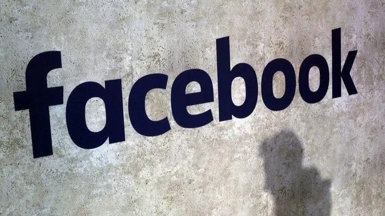 Facebook removes QAnon conspiracy group after repeated policy violations Facebook