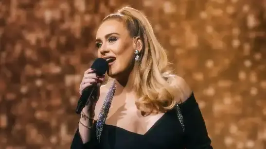 Adele denies writing lyrics of song fan tattooed on his arm | Watch Adele