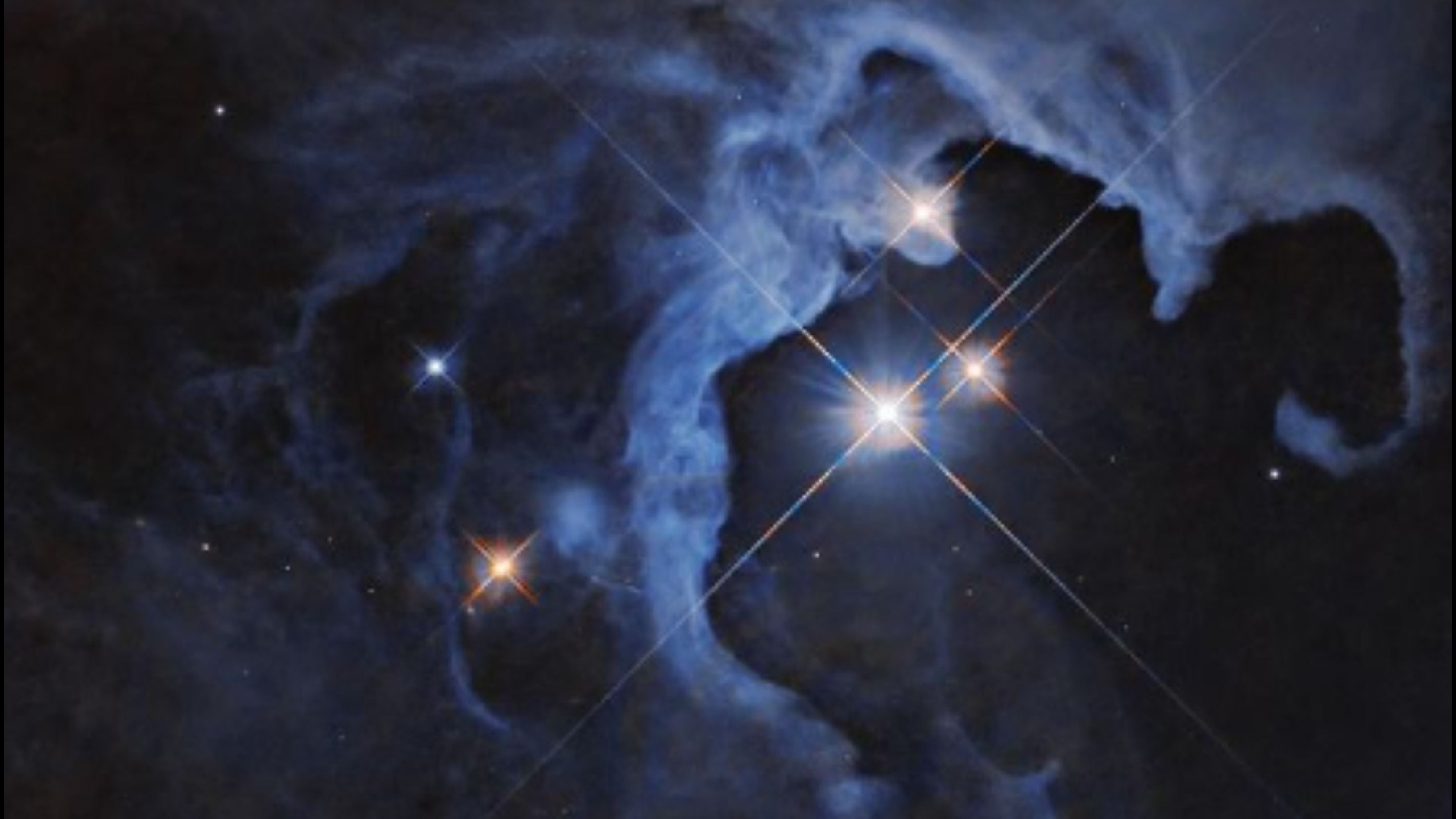 Nasa’s Hubble Telescope Captures Triple-Star Family Bathed In Glowing Nebula- Republic World