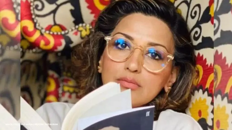 Sonali Bendre says 'go away' as she is busy reading book, uploads stunning candids Sonali Bendre