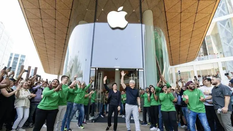 Apple opens first retail store in India; CEO Tim Cook welcomes the first customer Apple store in India