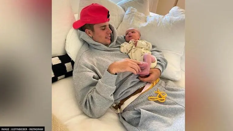 Justin Bieber bonds with friend's baby in adorable post; fans say 'you'll be a great dad' justin bieber