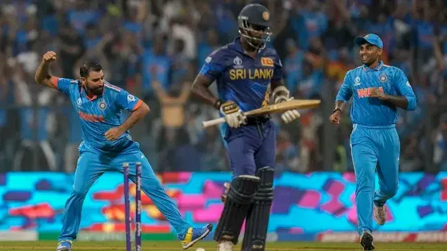 Mohammad Shami celebrates the fall of Angelo Matthews' wicket