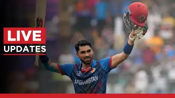 Ibrahim Zadran celebrates his century