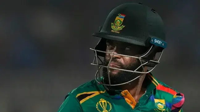 Temba Bavuma walks back to the dressing room