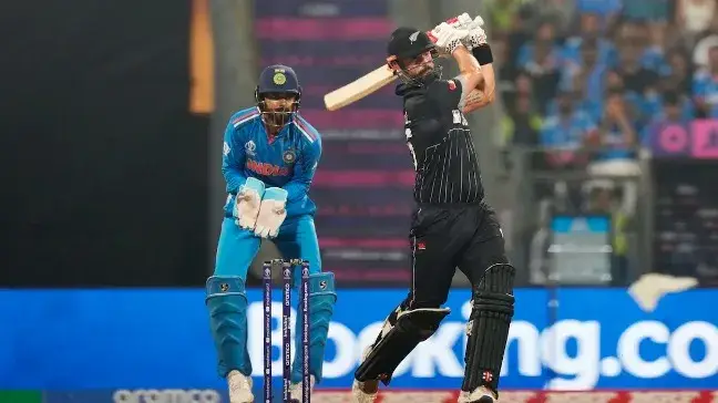 Daryl Mitchell plays a shot 