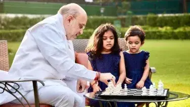 Amit Shah's picture with his granddaughters goes viral, netizens react Union Home Minister Amit Shah with with his grandchildren