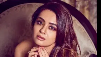 Surveen Chawla sports all-white ensemble while posing for the paps in