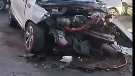 Car rams into an electric bus in Delhi's Moti Nagar, driver injured.