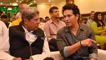 Sachin Tendulkar with Kapil Dev