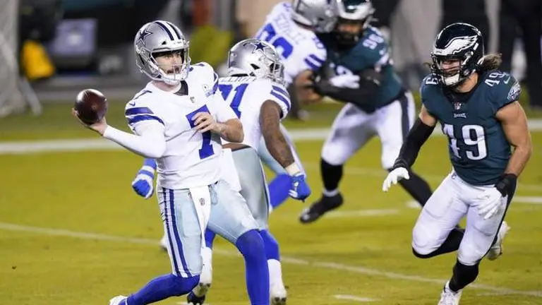 Cowboys try many tricks with rookie QB, fall to Eagles 23-9