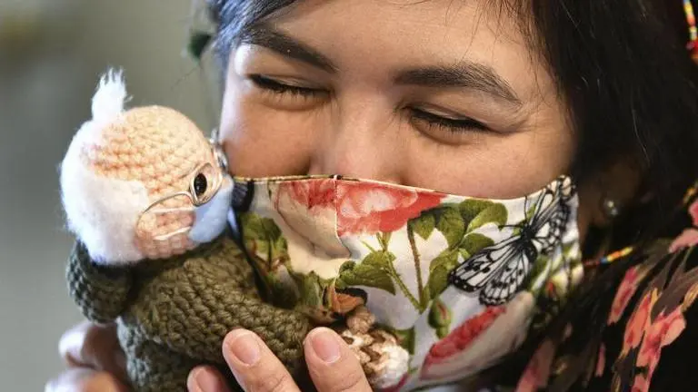 Woman sells Bernie doll for over $20K, donates to charity