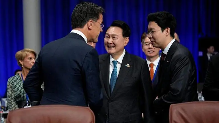 In Vilnius, South Korea’s Yoon Suk-yeol runs into ‘American Pie’ singing US Senator Yoon