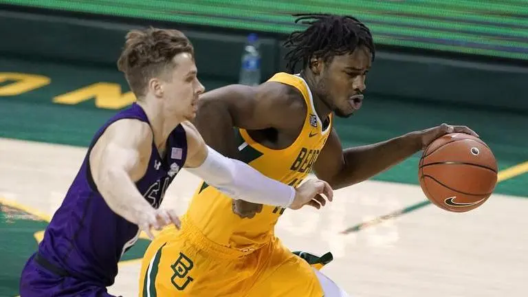 No. 2 Baylor wins delayed home opener 83-52 over SFA