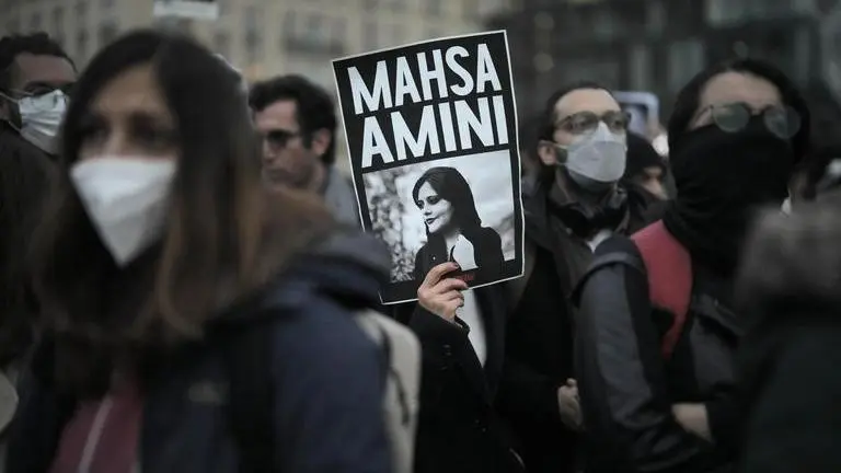 Iran summons Swiss envoy for Twitter post showing protest icon, Mahsa Amini: Report