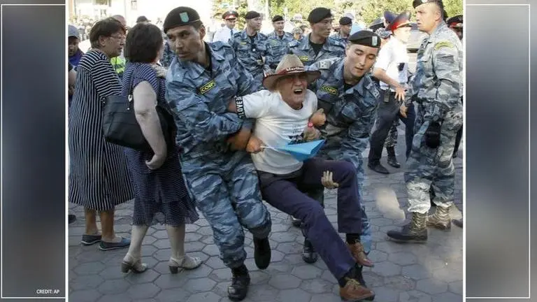 Kazakhstan Police detain dozens amid violent protests over political activist's death Police
