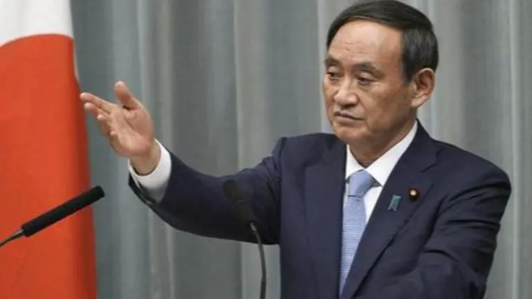 Suga: Tackling global warming can boost economies