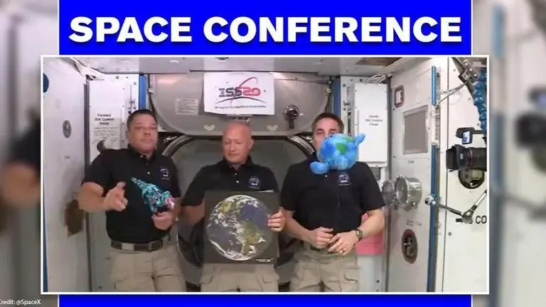Newest NASA arrivals address briefing LIVE from ISS; toy dragon & Earth bauble in tow NASA