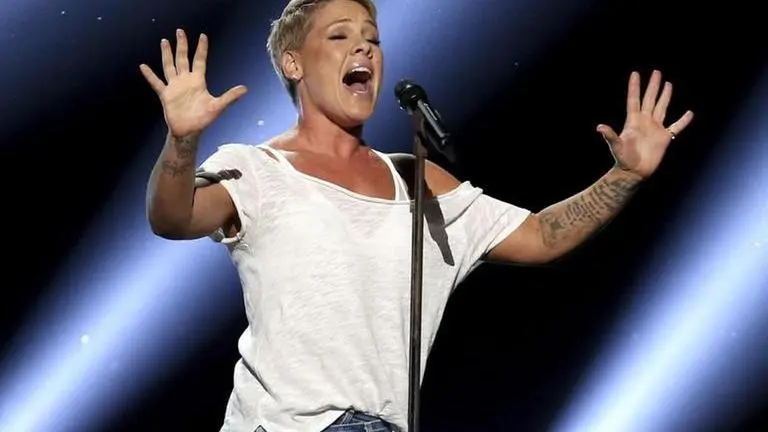 Singer Pink says she had COVID-19, gives $1M to relief funds