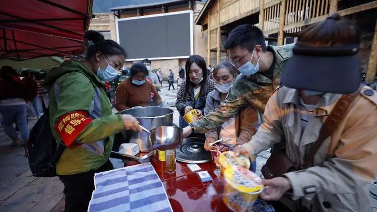 China scrambles to step up relief, 50,000 people relocated after Sichuan quake Earthquake in China