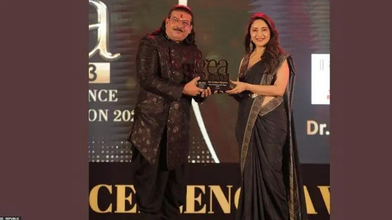 Best Astrologer in Kolkata - Best Celebrity Astrologer in India Awardee Astrologer Dr. Sridev Shastri with Madhuri Dixit