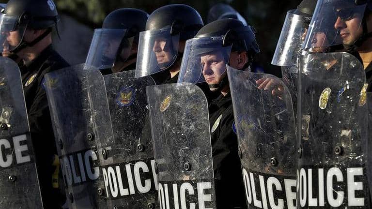 In US, 6 arrested after protest over the death of an activist turns ...