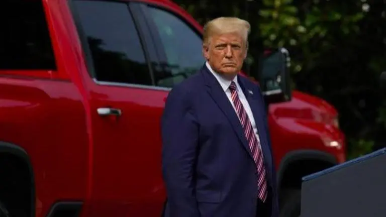 Trump offers confusion, contradictions on immigration order