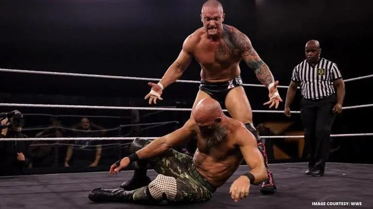 Karrion Kross pummels Tommaso Ciampa on his WWE NXT TakeOver debut karrion kross