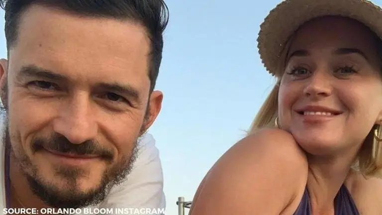 Katy Perry and Orlando Bloom say "do it for my Daisy Dove" as they urge people to vote Katy Perry