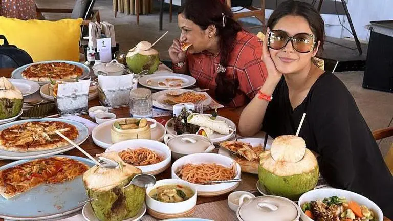 Shehnaaz Gill gorges on Pizza and Pasta, receives royal welcome in Thailand | Photos Shehnaaz Gill