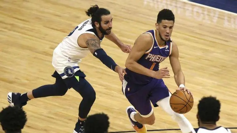 Booker scores 43 points, surging Suns beat T-wolves 118-99