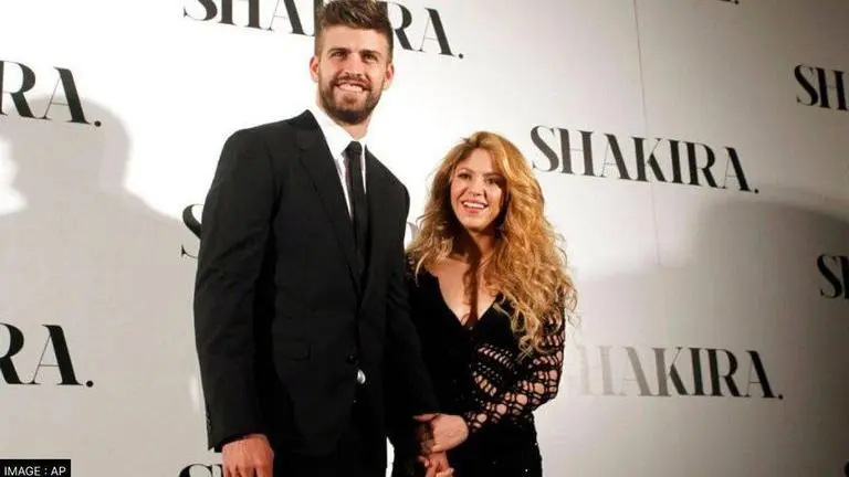 Shakira's new song says 'You traded Ferrari for Twingo'; fans ask if it's a dig at Pique Shakira with her ex-boyfriend Gerard Pique (Image: AP)