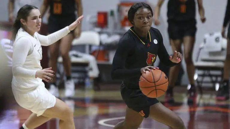 Coach: Louisville women ready for challenges of being No. 1