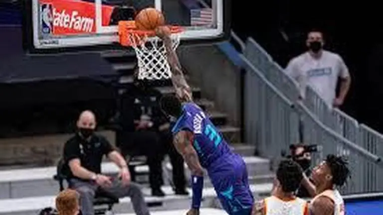 Ball youngest in NBA with triple-double, Hornets top Hawks