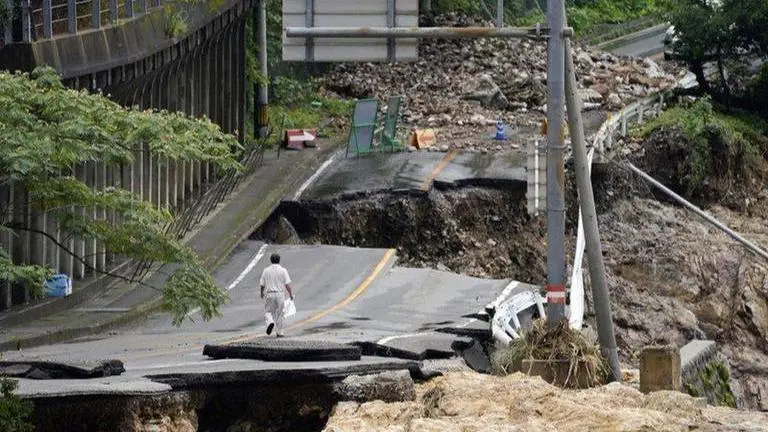 At least 50 dead, dozens missing in Japan floods