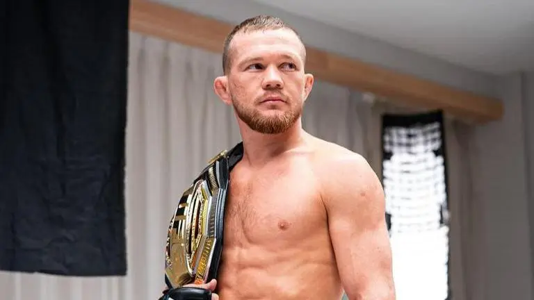 Russian MMA fighter Petr Yan lambasts opponent for posing with Ukraine flag at UFC 273 Petr Yan takes shot at Aljamain Sterling