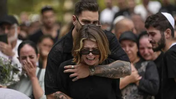 The Israeli public finds itself in grief and shock, but many pledge allegiance to war effort Israel grieves