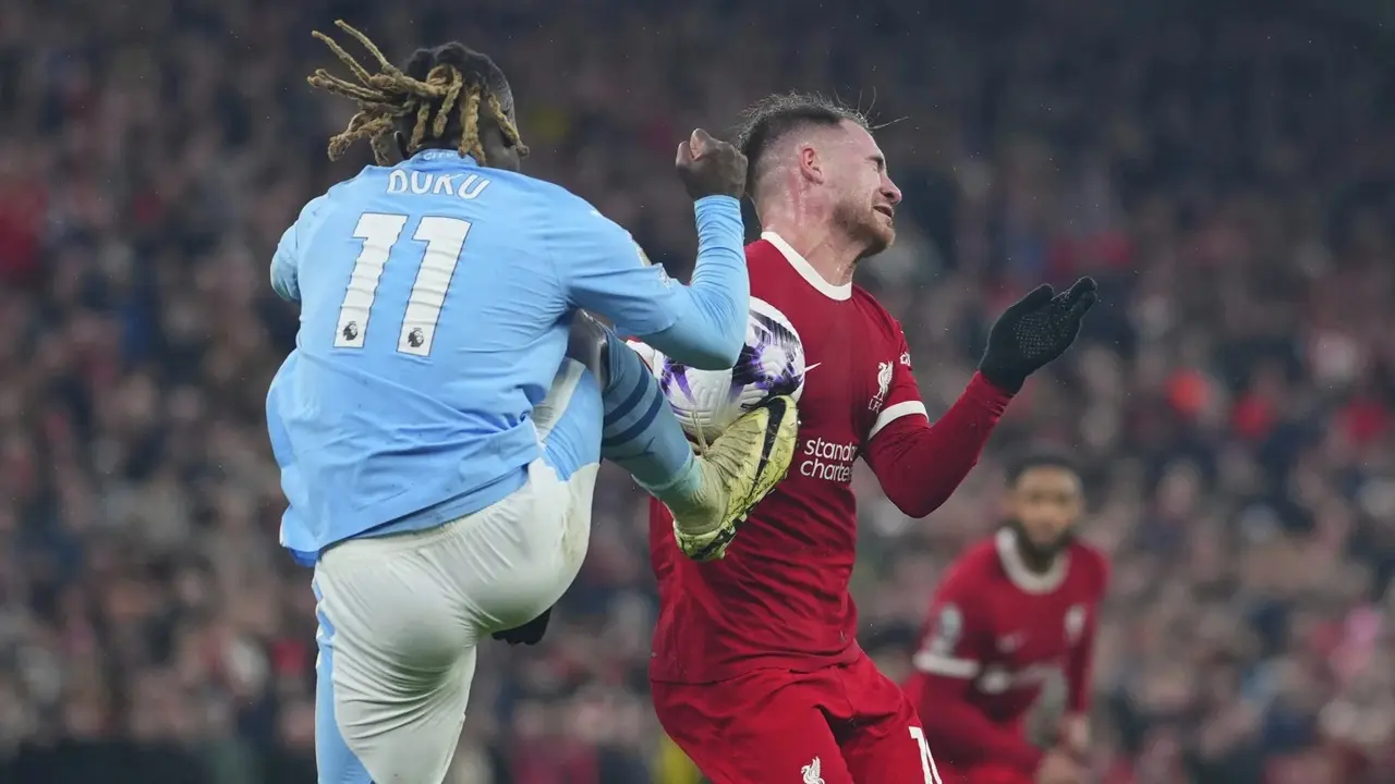Liverpool and Man City draw 1-1 in thrilling Premier League clash at Anfield Jeremy Doku