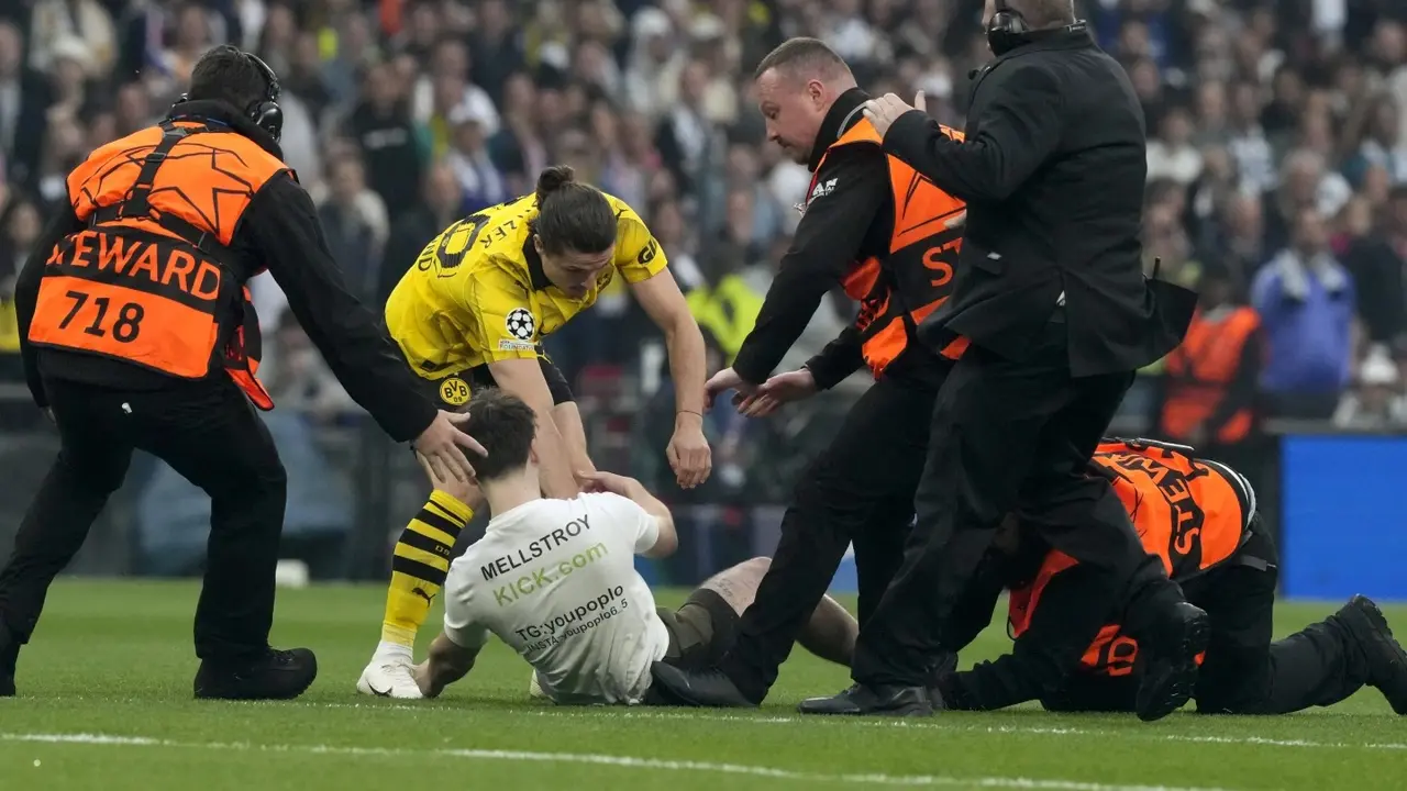 Champions League final halted inside a minute due to pitch invaders Champions League final halted