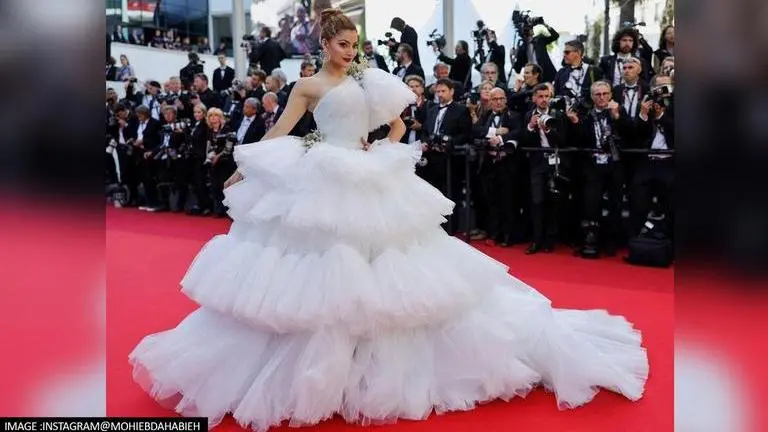 Cannes 2022: Urvashi Rautela makes her red carpet debut in a regal white ruffled gown Cannes 2022