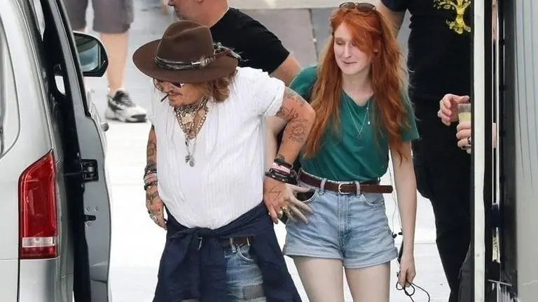 Johnny Depp spotted with red-haired mystery woman in Italy; fans beam with curiosity Johnny Depp