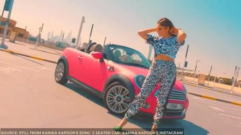 Kanika Kapoor's '2 seater car': Another song with fancy car + flashy outfits formula? Still from Kanika Kapoor's song '2 seater Car'
