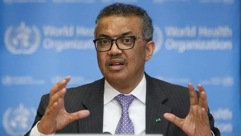 WHO chief says 'light at end of tunnel' on virus