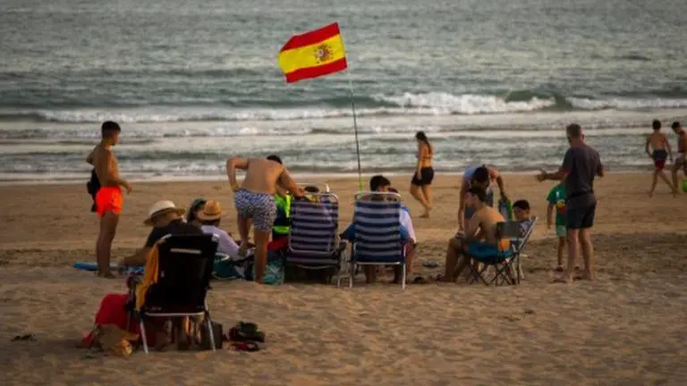 Spain takes aim at nightclubs and beaches as virus rebounds
