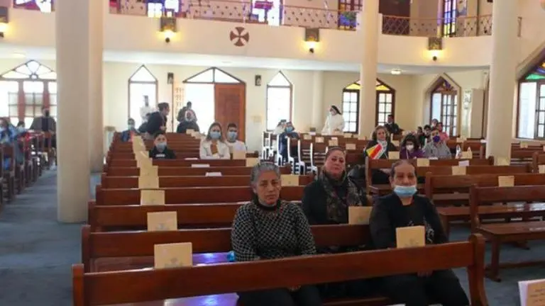 The Latest: Iraqis gather ahead of pope's arrival