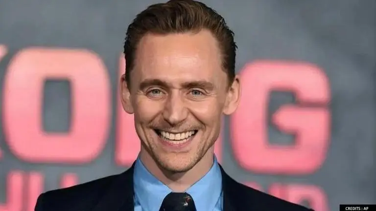 Tom Hiddleston compliments Chris Evans' butt, says 'it has absolutely rocked the spandex' Tom Hiddleston